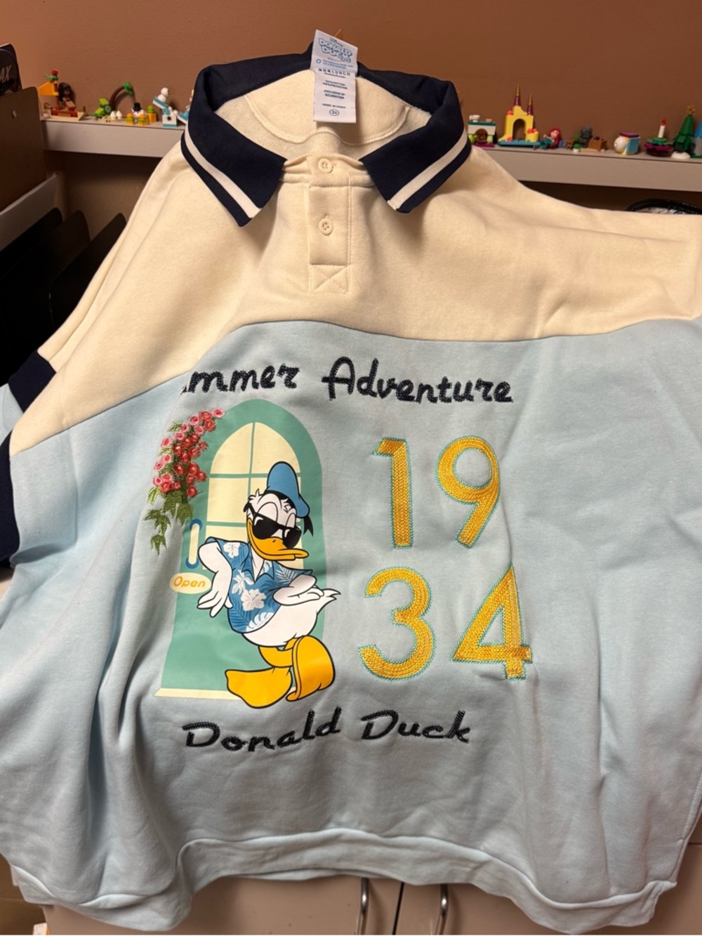 Donald Duck Colorblock Polo Sweatshirt - Light Blue & Cream